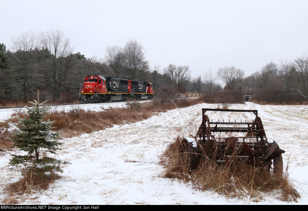 CN 5448 & 5469 bring L514 south down the Holly Sub with baretables at the headend